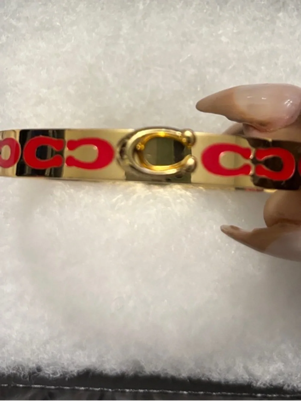 Coach Gold-Tone Cuff Bracelet with Red Signature Motif